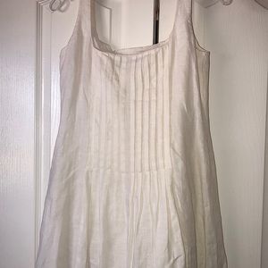 Pleated front and back, tank style with cotton lining top to bottom. No stains